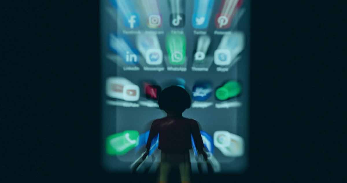 Lego Person being drawn in by social media icons